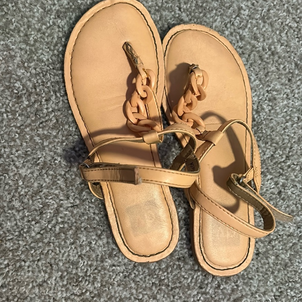 I am selling tan sandals